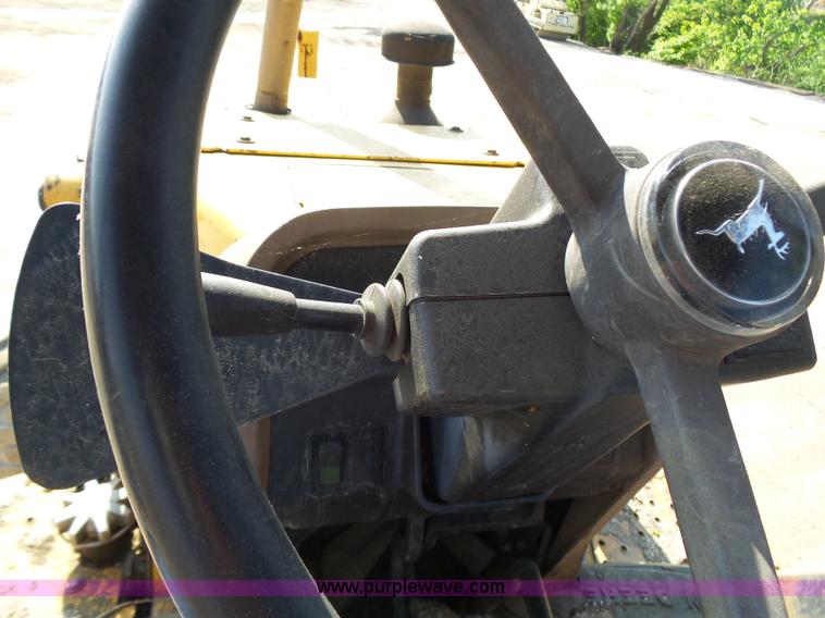 image for item K1378 John Deere 300D backhoe