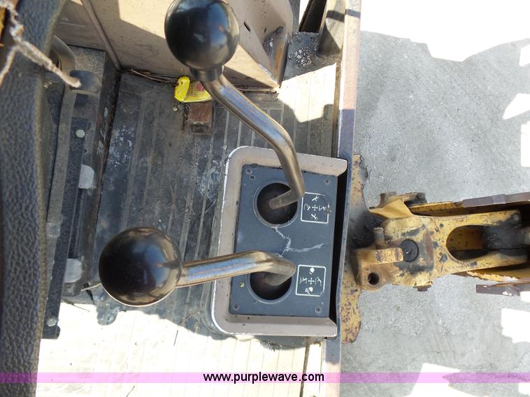 image for item K1378 John Deere 300D backhoe