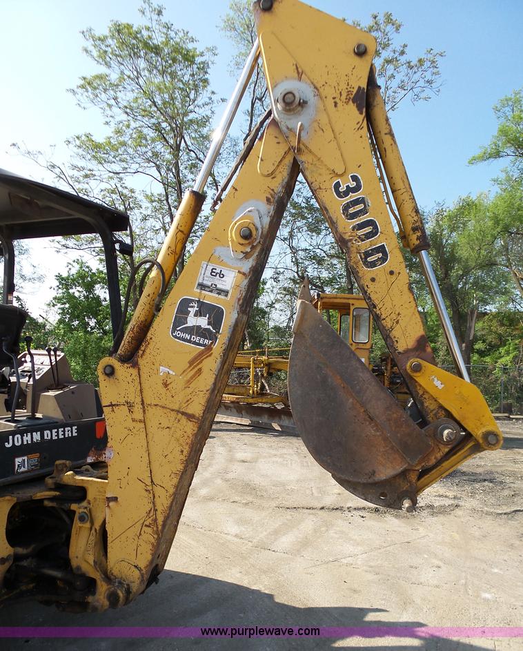 image for item K1378 John Deere 300D backhoe