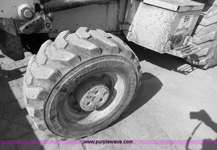 image for item K1378 John Deere 300D backhoe