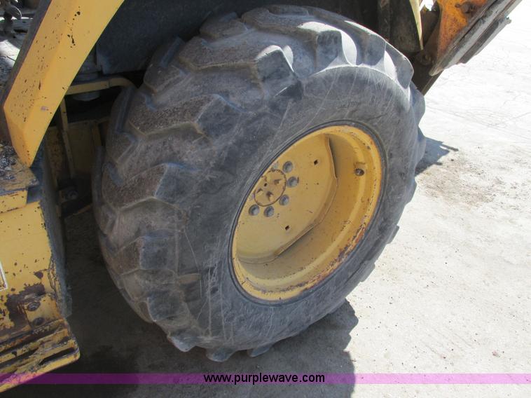 image for item K1378 John Deere 300D backhoe
