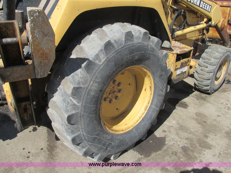 image for item K1378 John Deere 300D backhoe