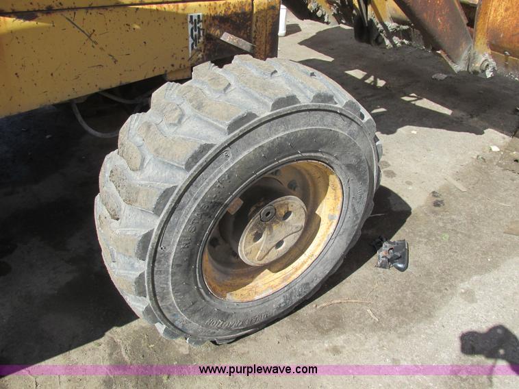 image for item K1378 John Deere 300D backhoe