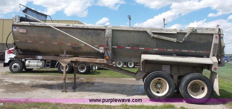 image for item K5219 1999 Travis HRS end dump trailer
