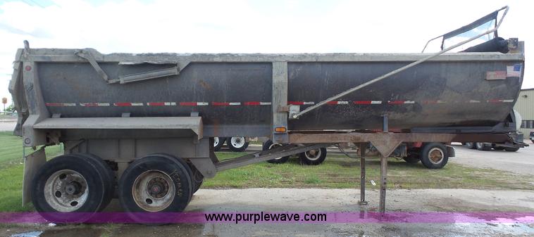 image for item K5219 1999 Travis HRS end dump trailer