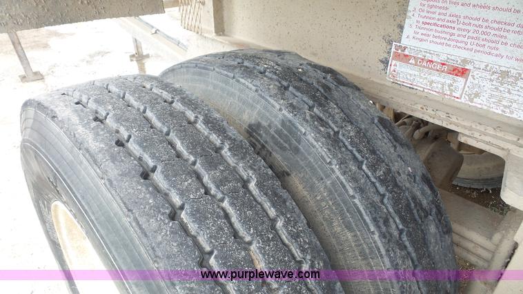 image for item K5219 1999 Travis HRS end dump trailer