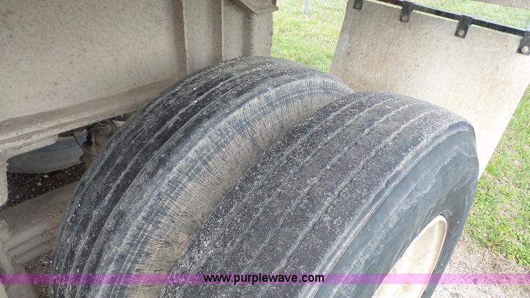 image for item K5219 1999 Travis HRS end dump trailer