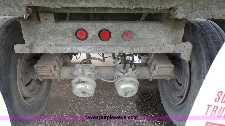 image for item K5219 1999 Travis HRS end dump trailer