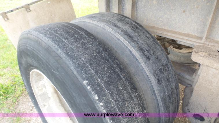 image for item K5219 1999 Travis HRS end dump trailer