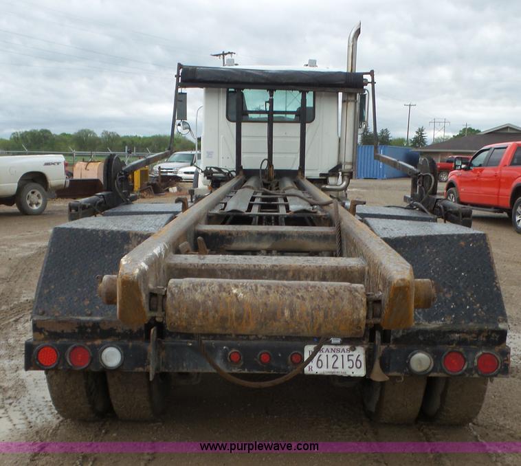 image for item K5231 2003 Mack CV713 roll off truck