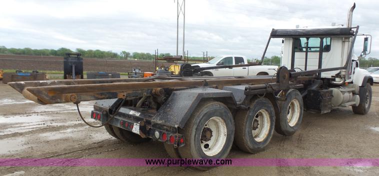 image for item K5231 2003 Mack CV713 roll off truck