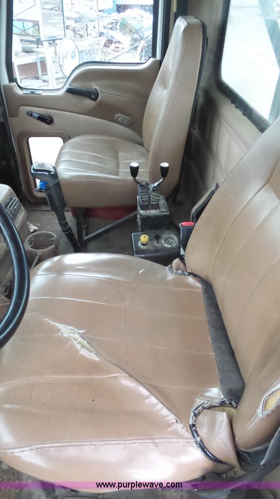 image for item K5231 2003 Mack CV713 roll off truck