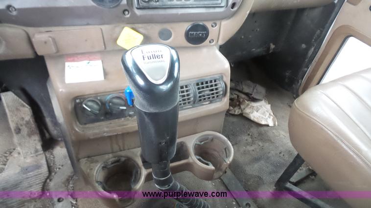 image for item K5231 2003 Mack CV713 roll off truck