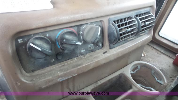 image for item K5231 2003 Mack CV713 roll off truck