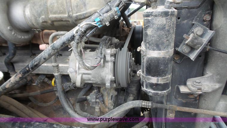 image for item K5231 2003 Mack CV713 roll off truck