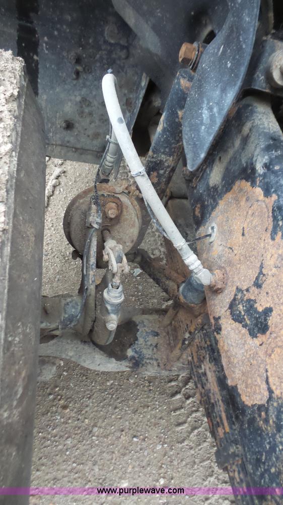 image for item K5231 2003 Mack CV713 roll off truck