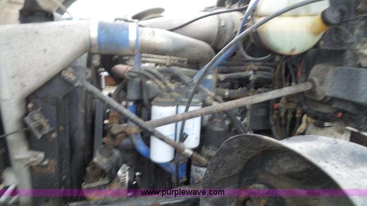 image for item K5231 2003 Mack CV713 roll off truck