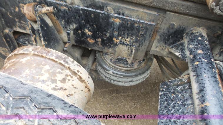 image for item K5231 2003 Mack CV713 roll off truck