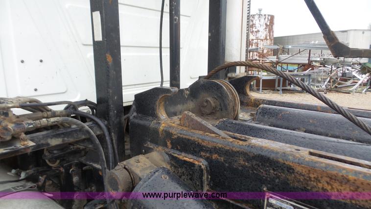 image for item K5231 2003 Mack CV713 roll off truck