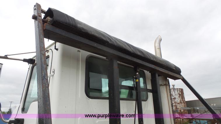 image for item K5231 2003 Mack CV713 roll off truck