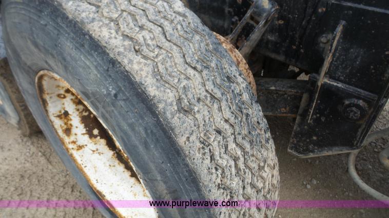 image for item K5231 2003 Mack CV713 roll off truck