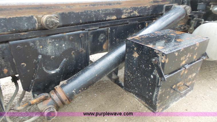 image for item K5231 2003 Mack CV713 roll off truck