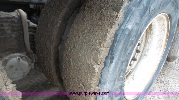 image for item K5231 2003 Mack CV713 roll off truck