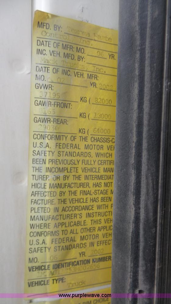 image for item K5231 2003 Mack CV713 roll off truck