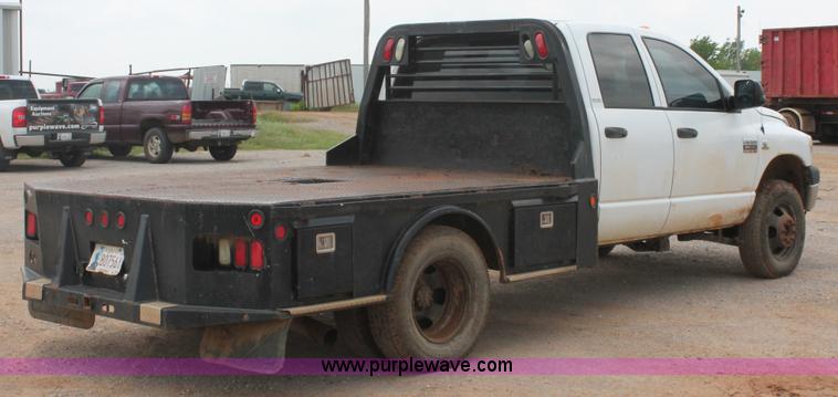 image for item K8885 2007 Dodge Ram 3500HD SLT Quad Cab flatbed pickup truck