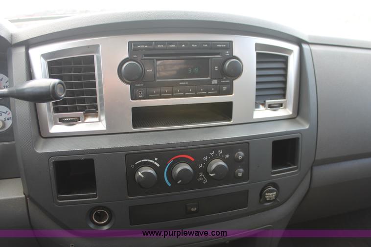 image for item K8885 2007 Dodge Ram 3500HD SLT Quad Cab flatbed pickup truck