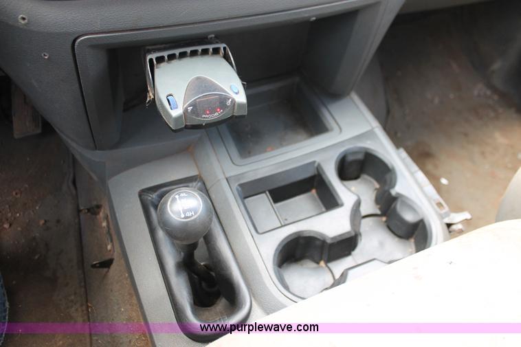 image for item K8885 2007 Dodge Ram 3500HD SLT Quad Cab flatbed pickup truck