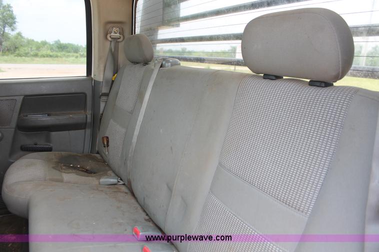 image for item K8885 2007 Dodge Ram 3500HD SLT Quad Cab flatbed pickup truck