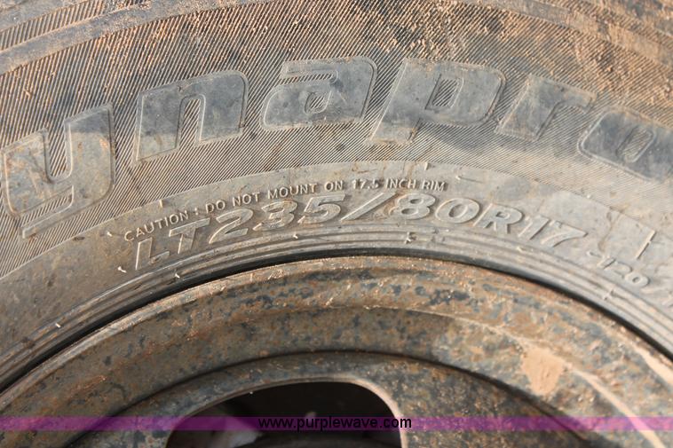 image for item K8885 2007 Dodge Ram 3500HD SLT Quad Cab flatbed pickup truck