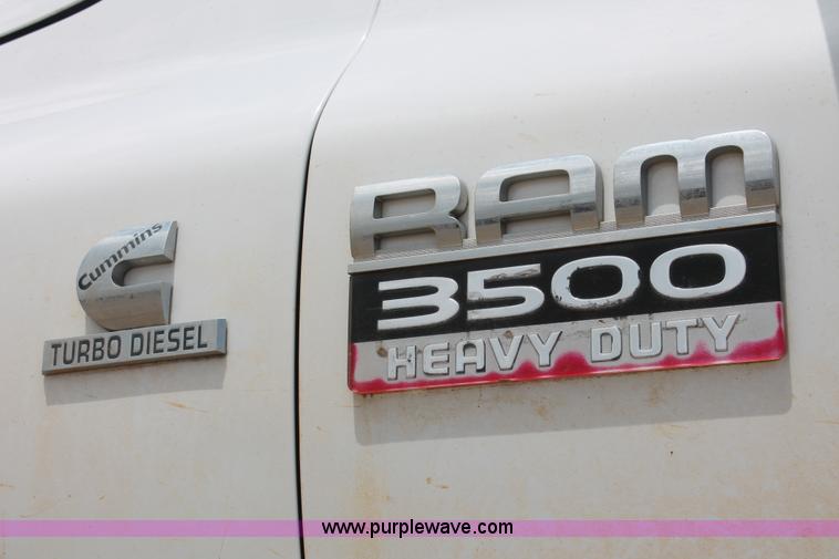 image for item K8885 2007 Dodge Ram 3500HD SLT Quad Cab flatbed pickup truck