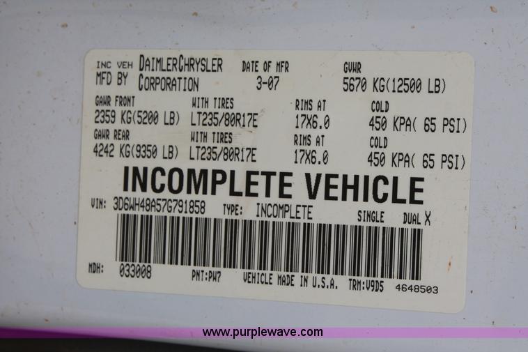 image for item K8885 2007 Dodge Ram 3500HD SLT Quad Cab flatbed pickup truck