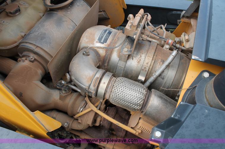 image for item K8902 2012 John Deere 310SK backhoe