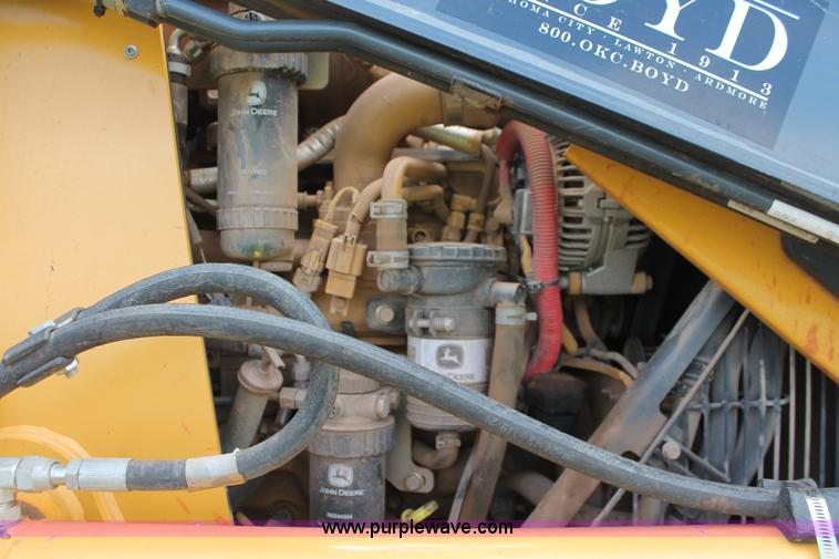 image for item K8902 2012 John Deere 310SK backhoe