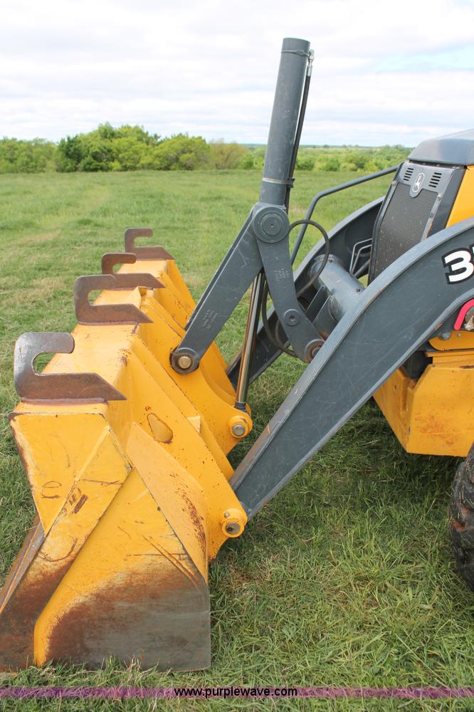 image for item K8902 2012 John Deere 310SK backhoe