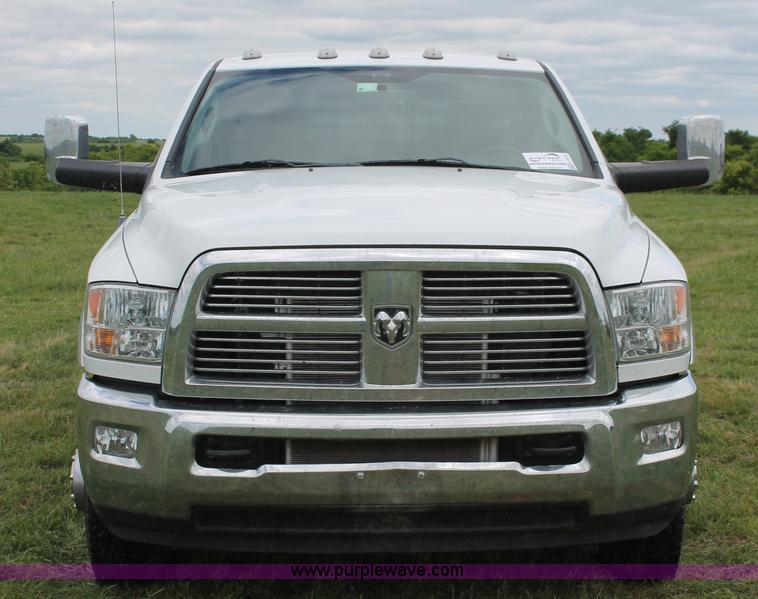image for item K8910 2012 Dodge Ram 3500HD Laramie Quad Cab flatbed pickup truck