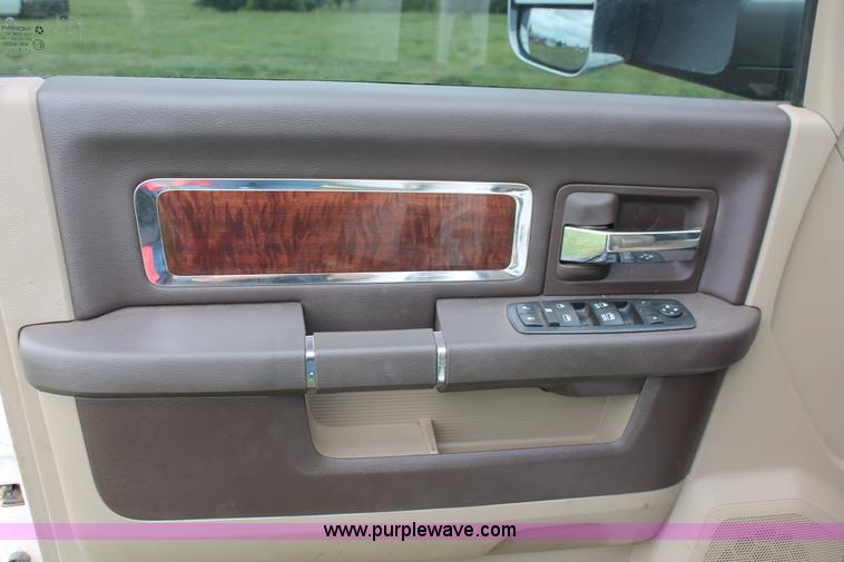 image for item K8910 2012 Dodge Ram 3500HD Laramie Quad Cab flatbed pickup truck