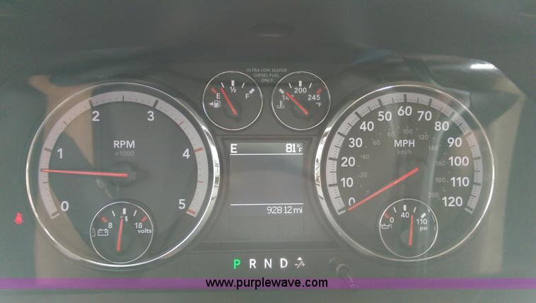 image for item K8910 2012 Dodge Ram 3500HD Laramie Quad Cab flatbed pickup truck