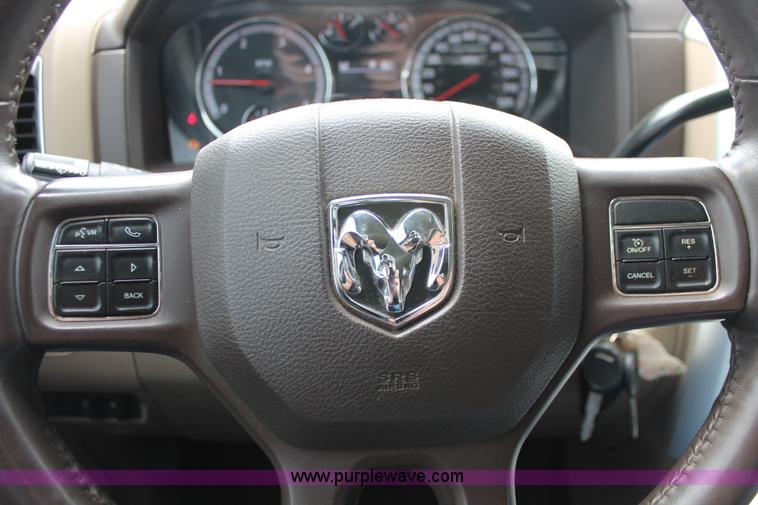 image for item K8910 2012 Dodge Ram 3500HD Laramie Quad Cab flatbed pickup truck