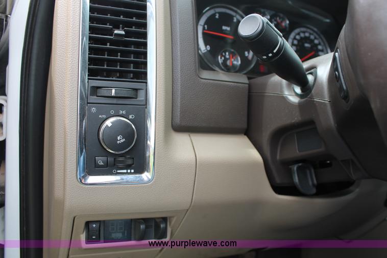 image for item K8910 2012 Dodge Ram 3500HD Laramie Quad Cab flatbed pickup truck