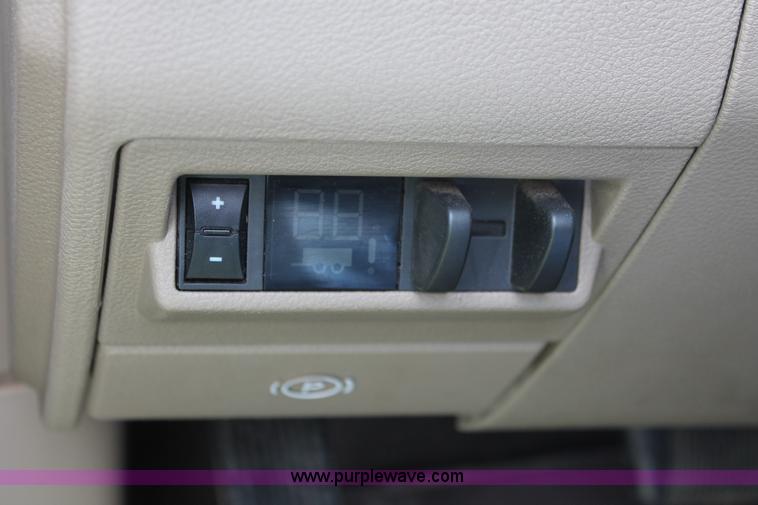 image for item K8910 2012 Dodge Ram 3500HD Laramie Quad Cab flatbed pickup truck