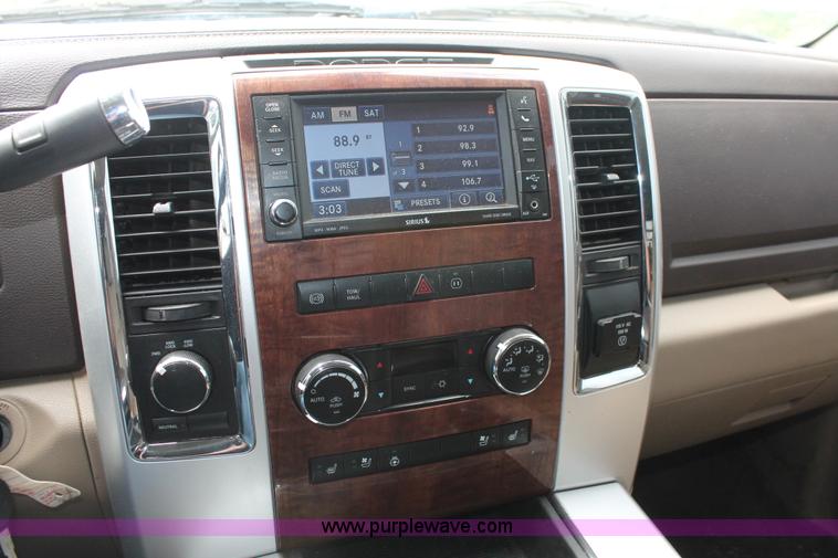 image for item K8910 2012 Dodge Ram 3500HD Laramie Quad Cab flatbed pickup truck