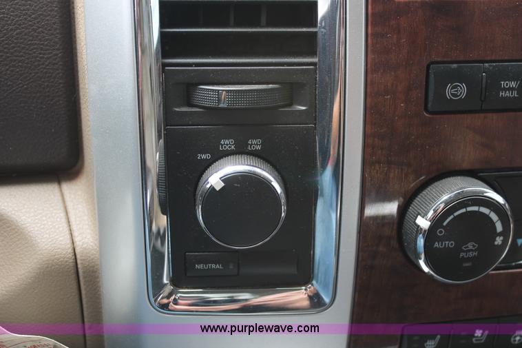 image for item K8910 2012 Dodge Ram 3500HD Laramie Quad Cab flatbed pickup truck