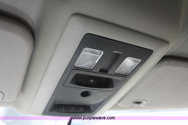 image for item K8910 2012 Dodge Ram 3500HD Laramie Quad Cab flatbed pickup truck