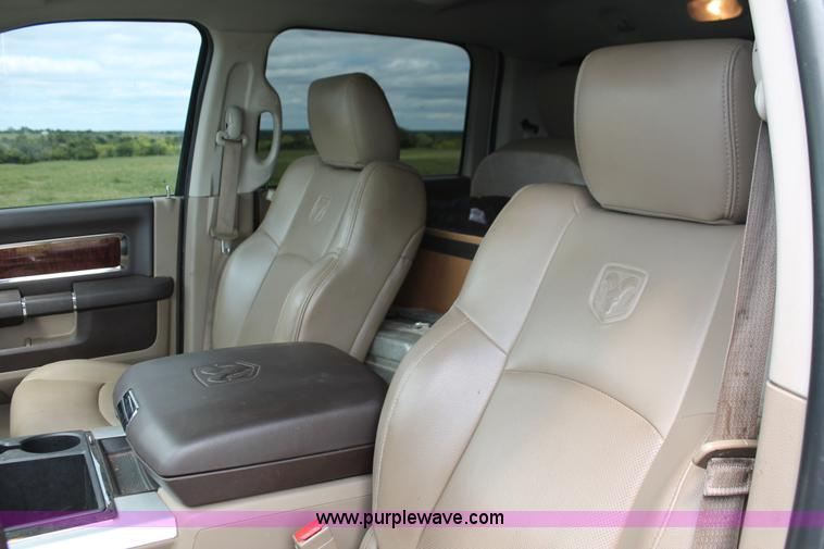 image for item K8910 2012 Dodge Ram 3500HD Laramie Quad Cab flatbed pickup truck