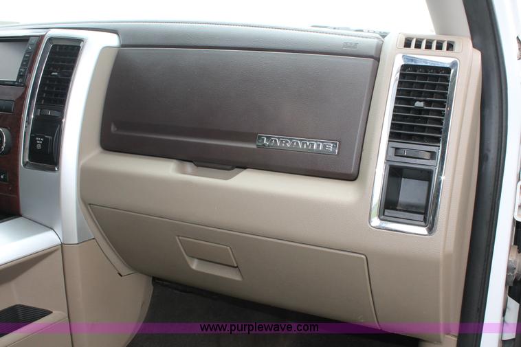 image for item K8910 2012 Dodge Ram 3500HD Laramie Quad Cab flatbed pickup truck