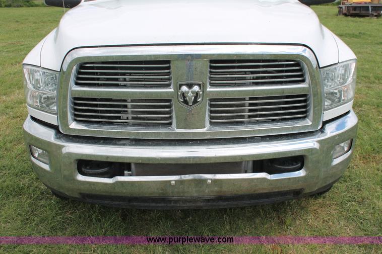 image for item K8910 2012 Dodge Ram 3500HD Laramie Quad Cab flatbed pickup truck